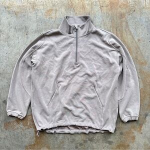 Lululemon Softstreme Half-Zip pullover with a cinchable hem.